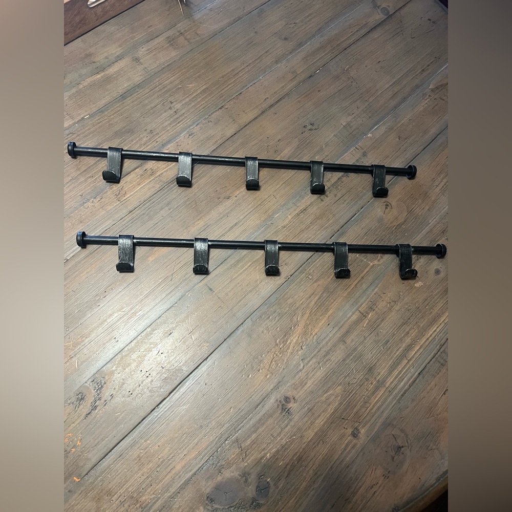 Metal wall mounted storage or coat racks